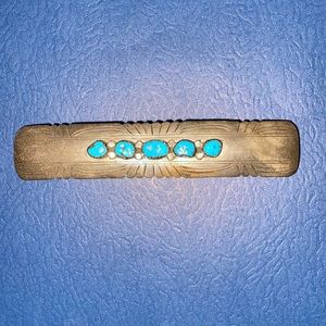 Silver and turquoise barrette.